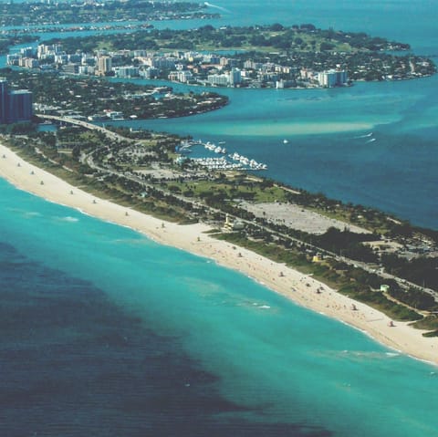 Take a stroll down famous Miami beaches, just a short drive away