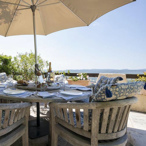 Sip a morning cup of coffee and admire the view from the lovely stone terrace