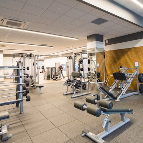 Head down to the gym on the building's ground floor and pump some serious iron