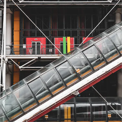 Stroll fourteen minutes to the Centre Pompidou to admire the incredible architecture