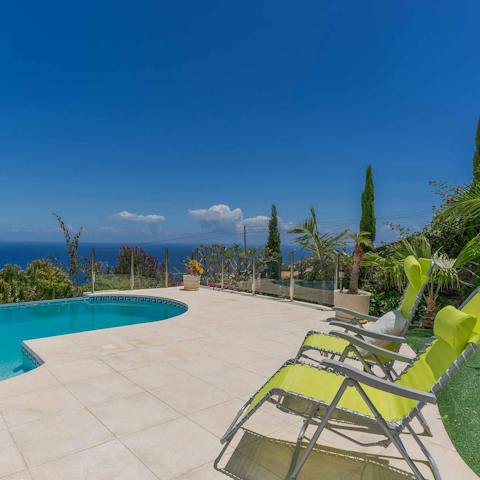 Soak up the sun on a poolside lounger, or enjoy a cooling dip in the blue waters