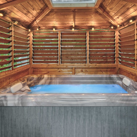 Relax in the hot tub after a day in the Great Outdoors