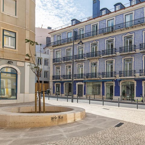 Stay in a historic building covered in traditional blue tiles right in the heart of Santos