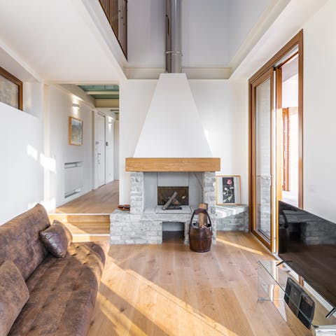 Cosy up in front of the fireplace