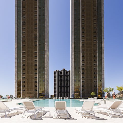 Jump in the communal pool after visiting Sierra Helada Natural Park, 2 km away