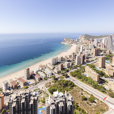 Saunter 150 metres to the Playa de Poniente, backed by a busy promenade