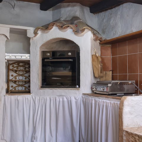 Fire up unforgettable alfresco feasts in the open-air kitchen