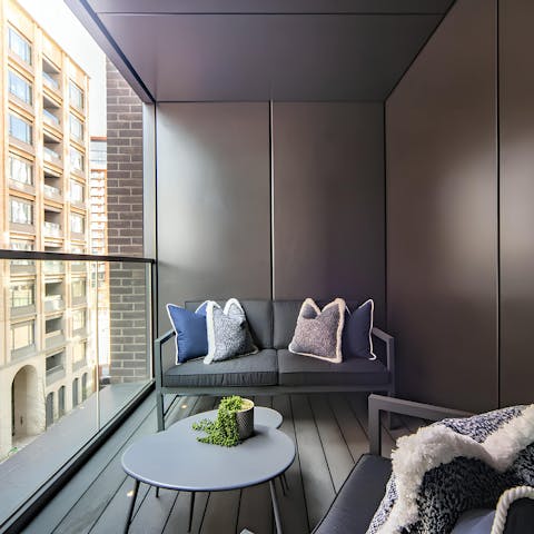 Enjoy a glass of wine on the enclosed balcony
