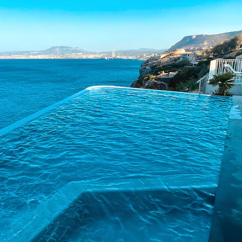 Swim in the private pool to cool off in the Greek heat