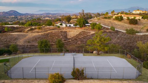 Serve against a backdrop of sun-warmed Temecula hillsides