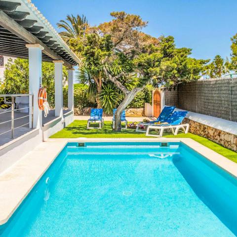 Spend lazy days drifting between the pool and a sun lounger