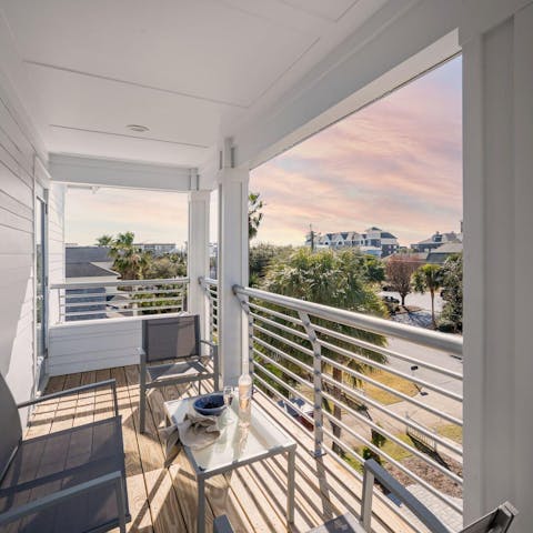 Treat yourself to a glass of bubbles on one of the balconies