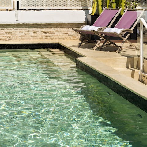 Chill by the pool in this city-centre haven
