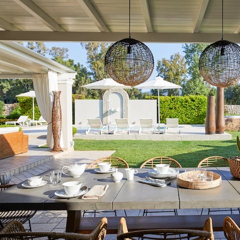 Look out towards the beautiful garden with a cup of tea on the terrace