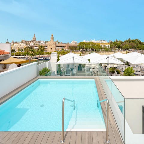 Enjoy a refreshing dip in the communal pool after a day of sightseeing