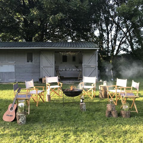 Gather around the fire pit after getting creative in the stable studio