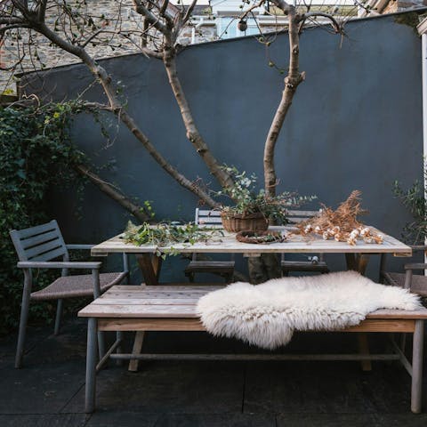 Tuck into an alfresco feast under the olive trees
