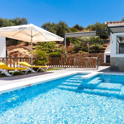 Lounge by the private pool and enjoy refreshing dips