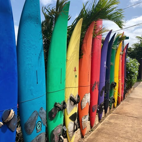 Head to the beach and catch some waves