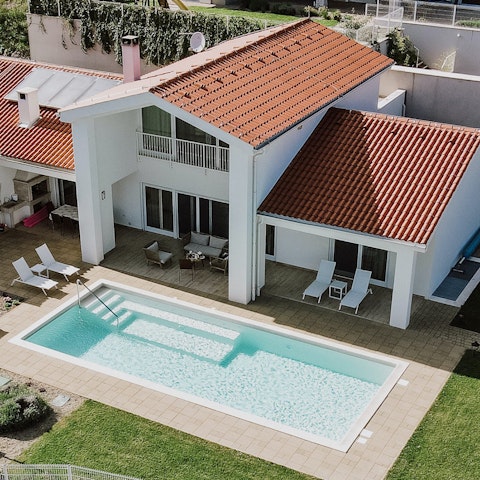 Spend lazy days chilling by the pool