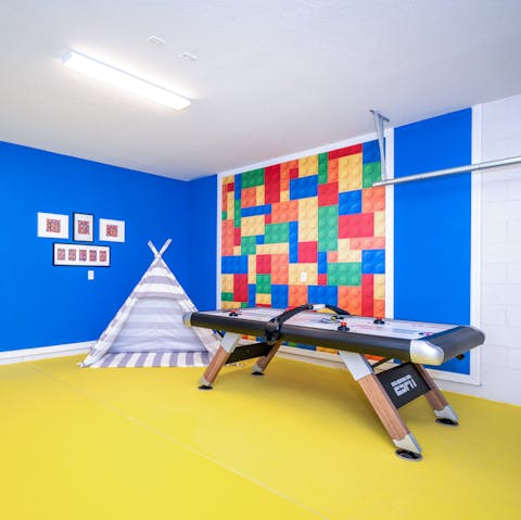 Challenge the whole family to a game of air hockey