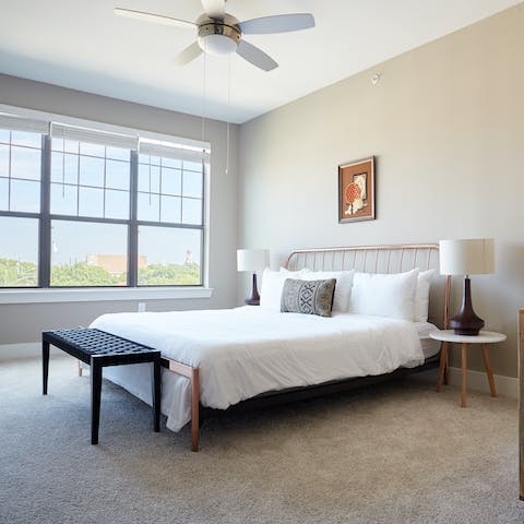 Take in the green views from the lofty bedrooms upstairs