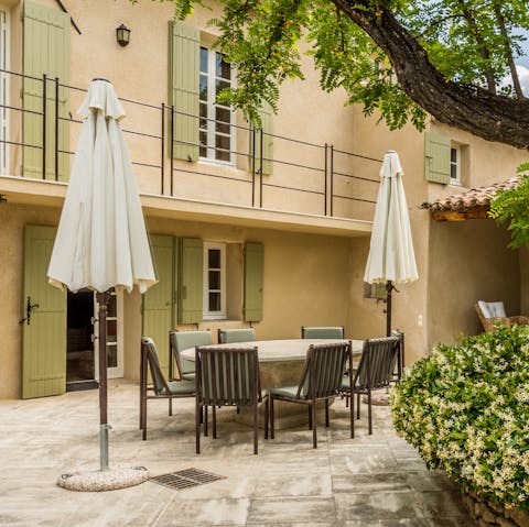 Dine alfresco with a glass of locally produced wine