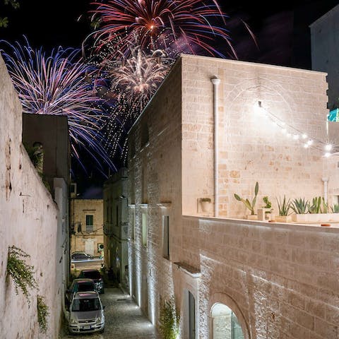 Wander the ancient streets of Ostuni and catch an impromptu festival