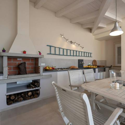 Embrace the Sicilian lifestyle and prepare food in your charming outdoor kitchen