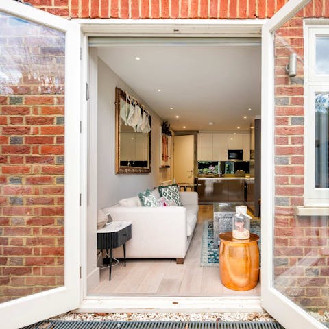 Step out to your private patio from the French doors in the lounge