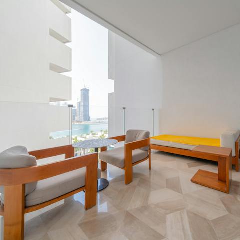 Enjoy your morning coffee from the private balcony overlooking the marina