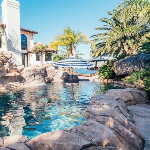 Cool down in the lagoon-inspired swimming pool