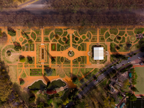 Relax in Parque España, a charming urban garden just nine minutes on foot
