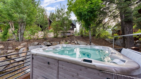Slip into the hot tub as the last light fades over the treeline