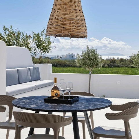 Dine alfresco while gazing out to sea