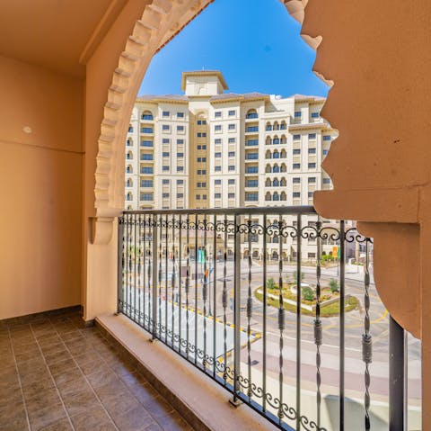 Sip a cool drink on the shaded private balcony