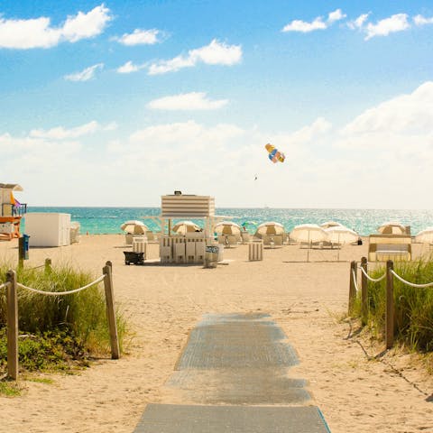 Lounge on Miami beach, soaking up the sunshine