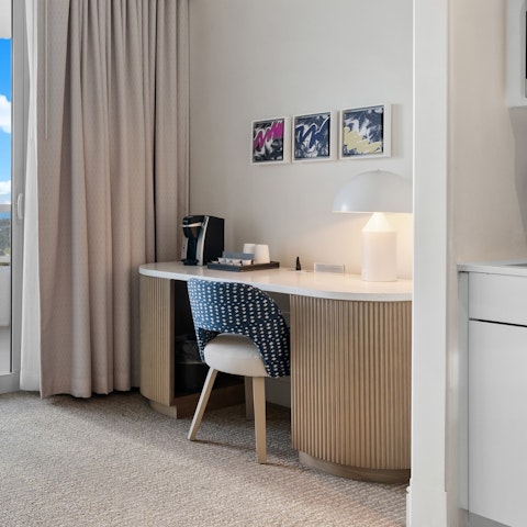 Plan your itinerary for your stay, sitting at the desk