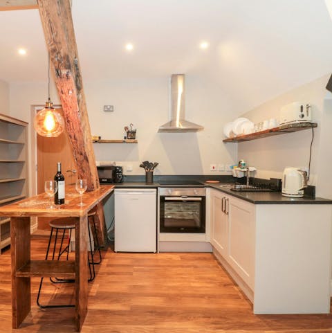 Enjoy a glass of Dorset wine at the bar table