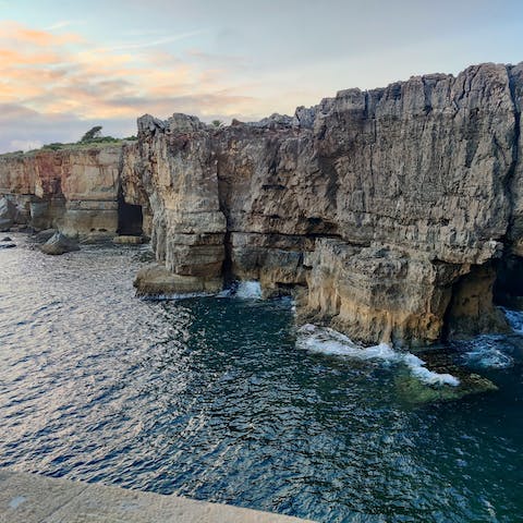 Walk along the rugged coastline near the villa