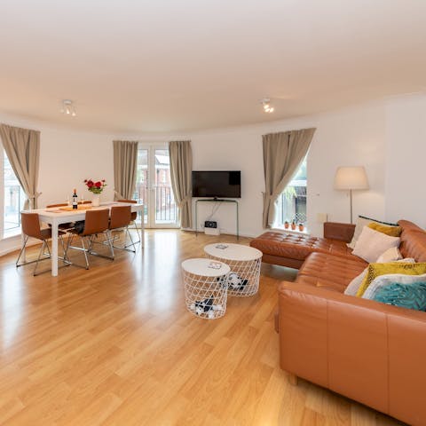 Unwind in the spacious living room with a Juliet balcony