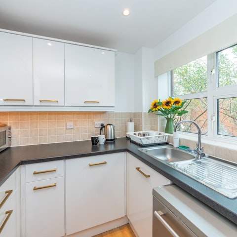 Prepare snacks or meals in the convenient kitchen