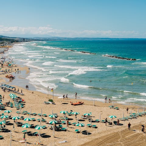 Spend the afternoon at the nearby beach, within a twenty–minute drive away