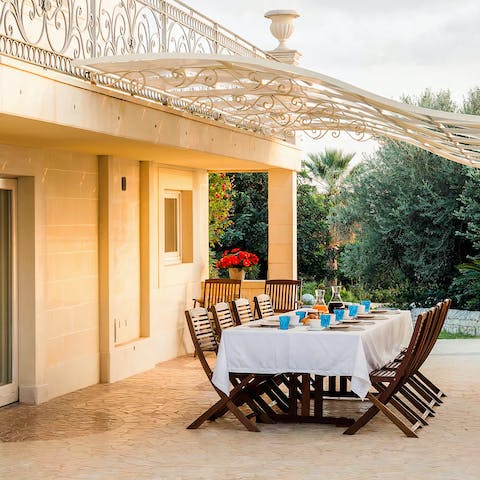 Set the table for an antipasto feast on the beautiful dining terrace