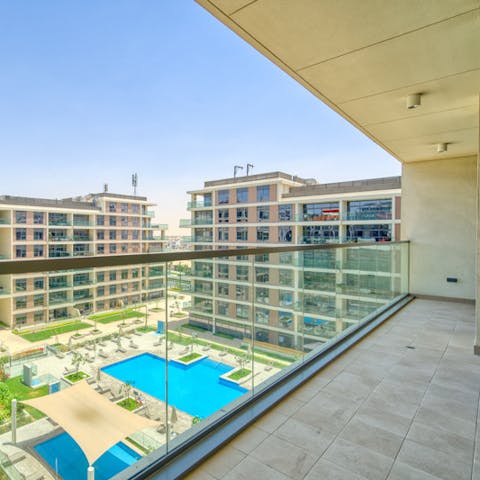 Head down to the building's shared swimming pool for a cooling dip