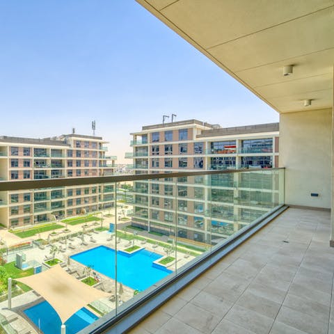 Head down to the building's shared swimming pool for a cooling dip