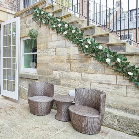 Catch the evening sun and soak up the salty air on your private patio, a glass of wine in hand