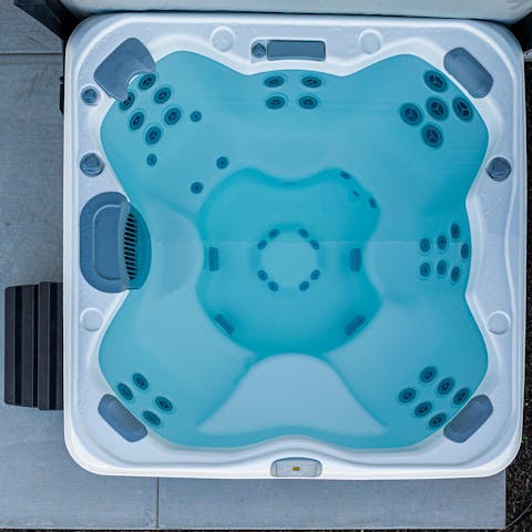 Unwind in your private hot tub while you soak in the view