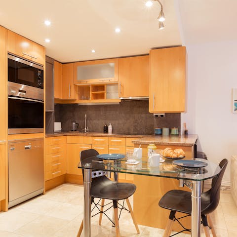 Rustle up breakfast in the sleek kitchen