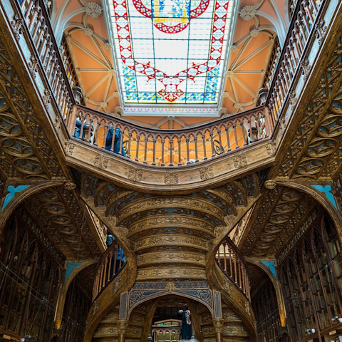 Admire the intricate architecture of Livraria Lello before picking up a bestseller